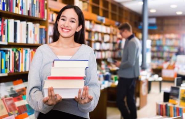 Young Girl with Stack of Books