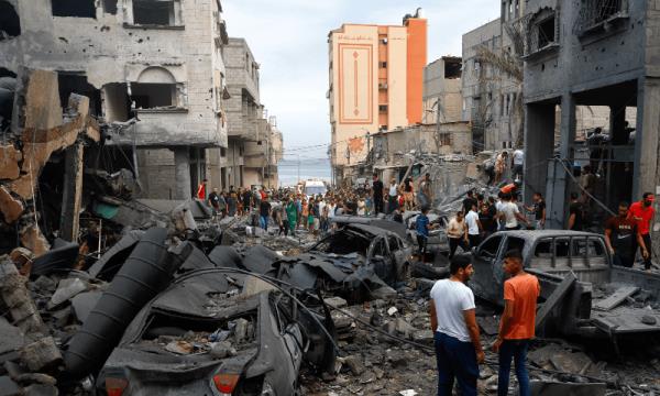  Palestinians inspect damages in the aftermath of Israeli strikes, following a Hamas surprise attack, at Beach refugee camp, in Gaza City, October 9, 2023. — Reuters 