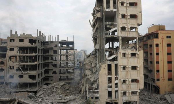 A picture shows a view of the destruction from Israeli airstrikes in Gaza City’s al-Rimal neighbourhood early on October 10, 2023. — AFP